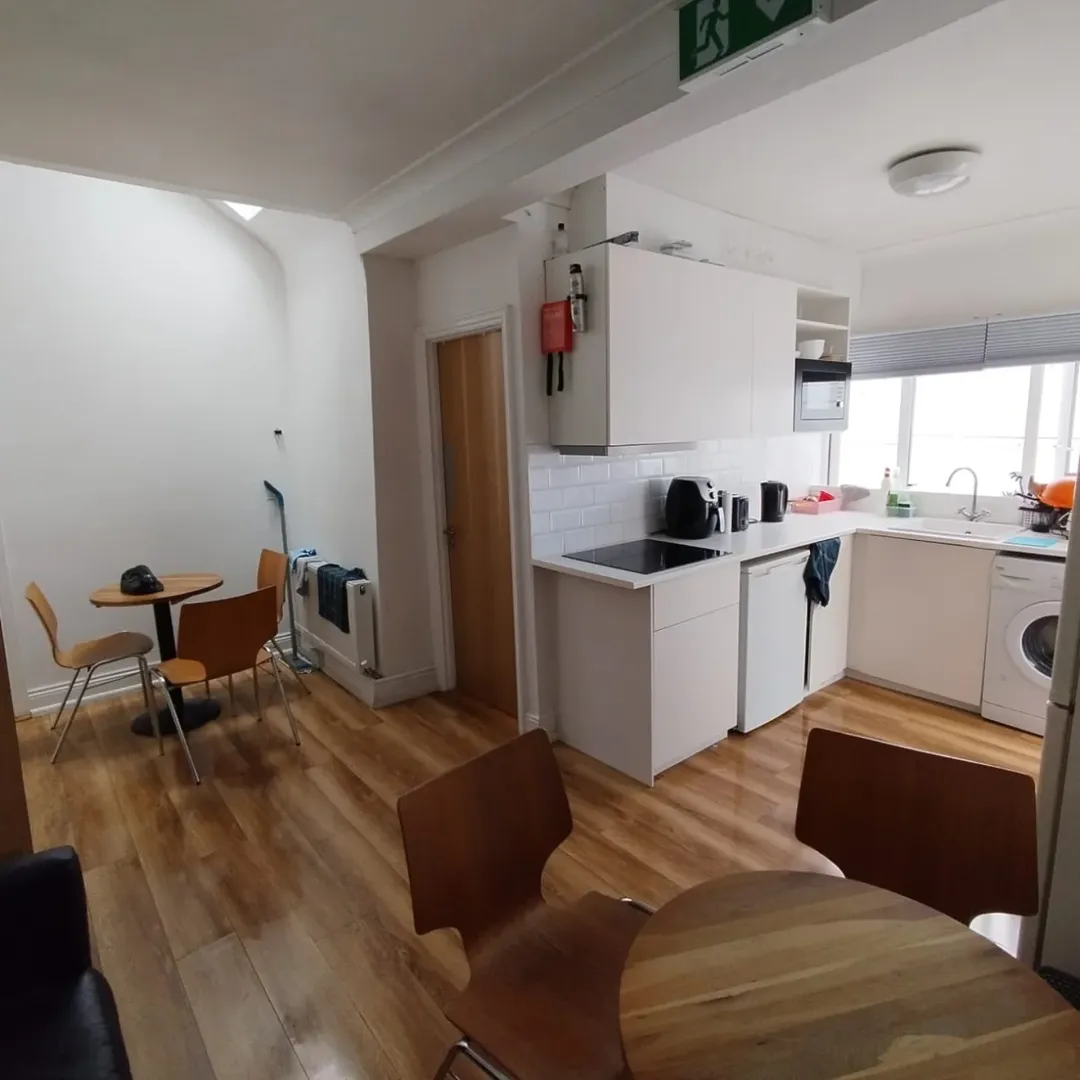 Bright Kitchen White Cabinets Wood Floor 1
