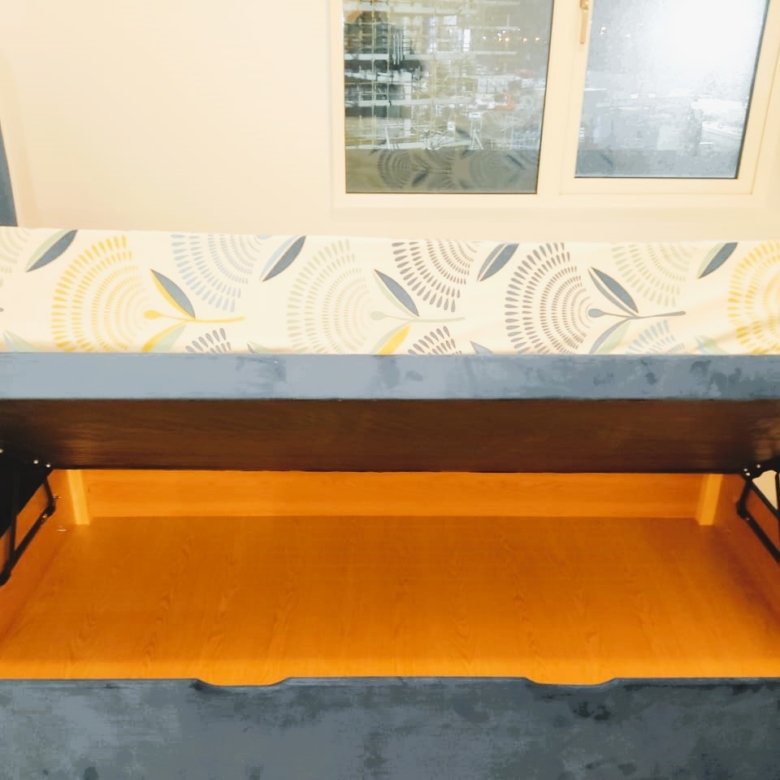 Open grey velvet ottoman bed with storage and patterned mattress – Ghar.ie property listing
